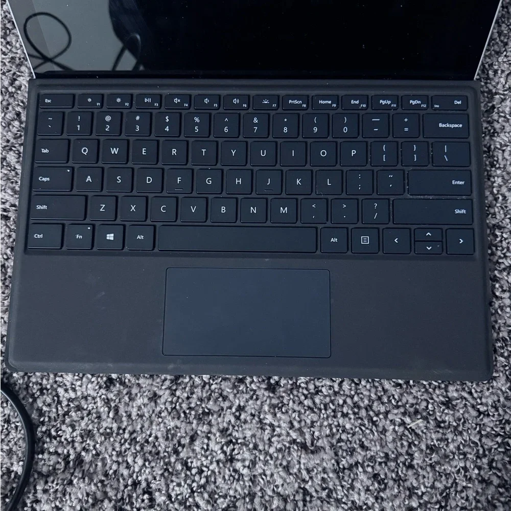 Microsoft Surface Pro 7 tablet in Silver with charger & keyboard